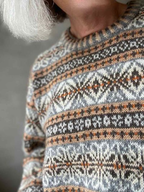 Knitting pattern for Krakær mens sweater by Ruth Sørensen This beautiful sweater, designed by the talented Ruth Sørensen, is nothing less than an adventure waiting to be explored. Ruth is an experienced, Daish knitwear designer who is very talented at designing Fair Isle knitting and mixing stunning colorways. Krakær sweater is designed in 5 sizes using our No 20 yarn made of 100% Shetland wool. Ruth has curated an amazing color profile with 8 colors for this fantastic design. With this design y Knitted Winter Sweaters, Knit Ski Sweater Pattern, Shetland Knitting Patterns, Jacquard Knit Sweater, Color Work Sweater Knitting Patterns, Faire Isle Sweater, Norwegian Knitting Pattern, Colorwork Knitting Patterns Sweaters, Scandinavian Knitting Patterns