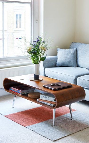 The Hooper Storage Coffee table in walnut brings instant retro style to your living room. Coffee Table Apartment, Sectional Coffee Table, Inspiring Homes, Colorful Coffee Table, Retro Coffee Tables, Storage Coffee Table, Furniture Design Inspiration, Trendy Living Rooms, 아파트 인테리어