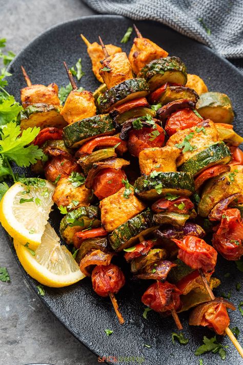 Easy recipe for a Middle Eastern classic, Chicken Shish Kebab featuring marinated chicken and vegetables, skewered and grilled to perfection. #chickenkebab #shishkebab Chicken Kabab, Low Calorie Chicken, Lamb Steaks, Chicken Kebab, Shish Kebab, Lemon Rice, Chicken Kabobs, Kebab Recipes, Chicken Kebabs