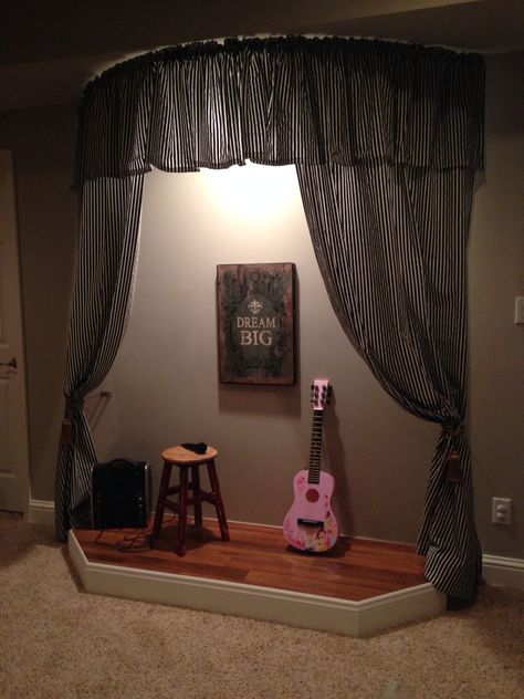 Playroom stage with curtains.                                                                                                                                                                                 More Stage Setup Ideas, Playroom Music Area, Basement Stage Ideas, Stage For Playroom, Stage In Playroom, Music Room Ideas School, Diy Music Room, Diy Karaoke Setup, Karaoke Stage Ideas