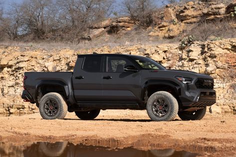 MPG & MSRP: Hybrid 2024 Tacoma - Trailhunter, TRD Pro & More! Tacoma Trailhunter, Blacked Out Tacoma, 2024 Tacoma Trd Pro, 2023 Tacoma Trd Off Road, Black Tacoma, 2024 Tacoma, 2024 Toyota Tacoma, Hybrid Trucks, Tacoma Trd Pro