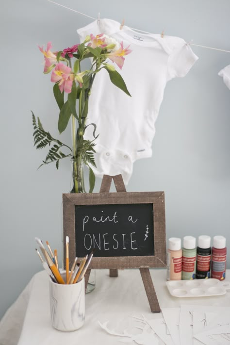 Baby Shower Decorate Onesies, Make Your Own Onesie Station, Baby Shower Paint Onsie, Baby Shower Painting Activity, Onsie Making Station Onesie Decorating, Paint Baby Onesie, Make A Onesie Station, Baby Shower Onesie Painting, Baby Shower Painting Onesies