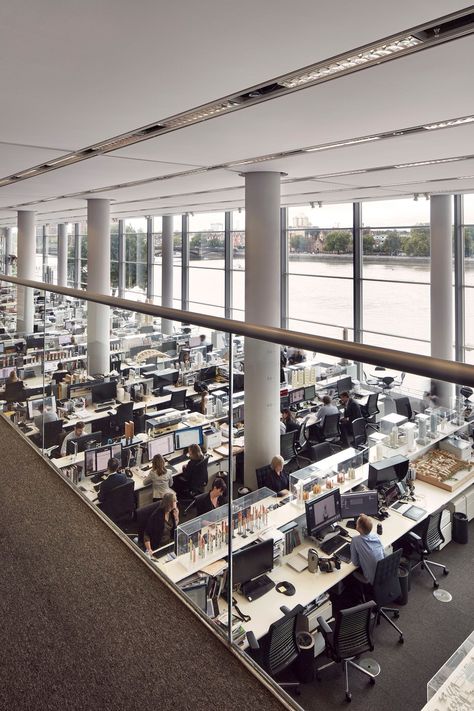 Walking into Foster’s London office, on the banks of the Thames in Battersea, you climb a broad stair past a café buzzing with colleagues grabbing coffee. Inside, a high-ceilinged space has a glass wall looking out on the river, the city, and the gray sky beyond. Models for projects new, old, and unrealized surround rows of desks in an impossibly quiet open work area. Ceo Office Design Luxury Modern, Ceo Office Design Luxury, Minimalist Office Space, Ceo Office Design, Seeing The Future, Open Concept Office, Banks Office, Finance Accounting, Urban Design Architecture