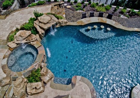 Get that resort style living with a pool and raised spa, waterfall, swimup bar and sun shelf! http://www.anthonysylvan.com/browse-pools-spas/pool-designs/free-form-pools/ Swimup Bar, Pool With Swim Up Bar, Anthony Sylvan Pools, House Pool Party, Spa Waterfall, Custom Inground Pools, Sun Shelf, Underground Pool, Paradise Pools