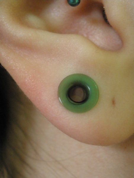 Gauged second hole so you can still wear regular earrings and have your ears gauged. I'm thinking about just gauging the second hole on my right ear 2 Guage Earring, Second Ear Piercing Stretched, 4 Gauge Stretched Ears, Small Ear Gauges Aesthetic, Stretched Second Hole, 2g Gauges Ears, Gauges With Earrings, 10 Gauge Ears, Double Zero Gauges Ears