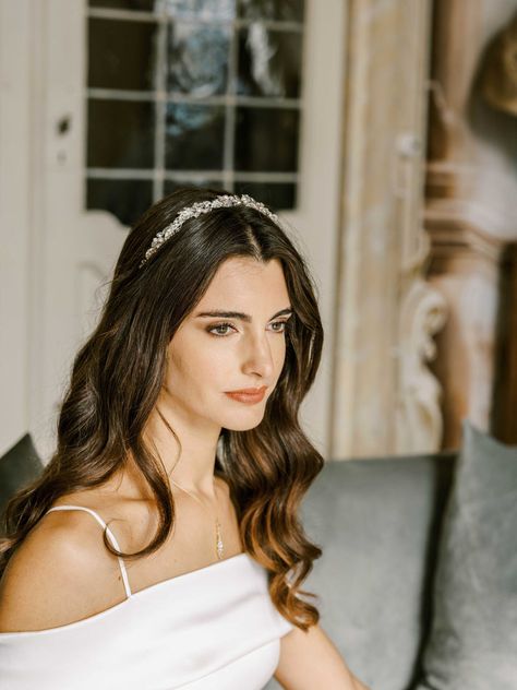 Designed to add a subtle shimmer to your bridal ensemble, our "Maeve" headband is truly gorgeous | wedding inspo, bridal hair styles, bridal hair accessories, bridal headpieces, headpieces for brides, bridal tiara, bridal crown, tiaras and crowns, headpieces for brides, luxury jewelry, diamond crown, bridal hair ideas, sparkly tiaras, bridal headband, crystal headband, christmas gift ideas, sparkly wedding tiara, diamond tiara,glamorous wedding, #bridetobe #wedding #weddinghair Wedding Hairstyles And Makeup, Beautiful Tiaras, Headband Tiara, Crystal Headband, Pearl Bridal, Bridal Show, Modern Bridal, Wedding Headband, Bridal Headband