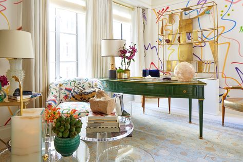 For his Kips Bay debut, designer Phillip Thomas used a Maison Jansen commode and desk — from Bernd Goeckler and Maison Gerard, respectively — outfit the space, but the formality ends there. The crème-hued upholstered walls are artfully defaced with swirls of spray paint, a pink sheep peeks out from beside the commode, and the side tables, including a trio of acrylic barbell pieces from Lorin Marsh, hold an array of colorful vessels and flora. Lady Lair, Kips Bay Showhouse, Fabric Covered Walls, Show House, Eclectic Home, Home Office Design, Architectural Digest, Elle Decor, Office Design