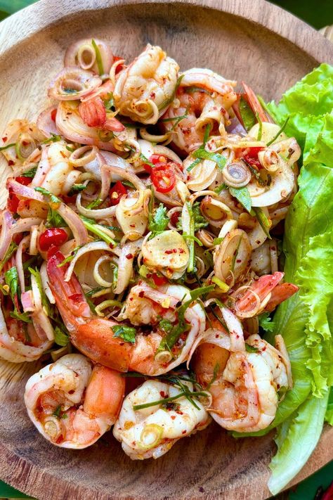 Try the Spicy Thai Shrimp Salad for a light and refreshing meal. It's loaded with healthy veggies and fresh herbs, dressed in a zesty Thai dressing, perfect for summer. Spicy Thai Shrimp Salad, Thai Shrimp Spring Rolls, Seafood Salads Cold, Asian Seafood Salad, Asian Summer Food, Thai Shrimp Appetizer, Shrimp Thai Salad, Summer Thai Recipes, Thai Dressing Salad