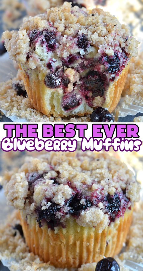 The image shows a close-up of a blueberry muffin with a sugar-crusted topping. The muffin has a golden-brown exterior, and you can see blueberries bursting with juiciness, their deep purple hues staining the surrounding cake. The texture of the muffin appears moist and fluffy with a streusel-like crumbly topping that glistens slightly, suggesting a sugary crunch. The focus is sharp, highlighting the textures and vibrant contrast between the golden cake and the dark blueberries. Blue Muffins Recipe, Pie, Best Blueberry Muffins With Streusel, Blueberry Muffins With Strudel Topping, Whole Grain Blueberry Muffins, Streusel Blueberry Muffins, Blueberry English Muffin Recipe, High Altitude Muffin Recipes, Best Ever Blueberry Muffins