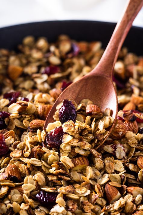 Photo of homemade granola with almonds and dried cranberries in a skillet Stovetop Granola Recipe, Skillet Granola Recipe, Quick Oats Granola, Skillet Granola, Vanilla Almond Granola Recipe, Alton Brown Granola Recipe, Granola Recipe Almond Butter, Granola Oats, Best Homemade Granola