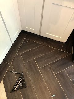 rustic love: Tutorial for Herringbone peel and stick planks Vinyl Plank Flooring Herringbone Pattern, Wood Look Tile Herringbone Pattern, 12x24 Herringbone, Vinyl Flooring Herringbone Pattern, Fibre Flooring Herringbone Dapple, Tile Spacers, Furniture Sliders, Peel And Stick Floor, Herringbone Floor