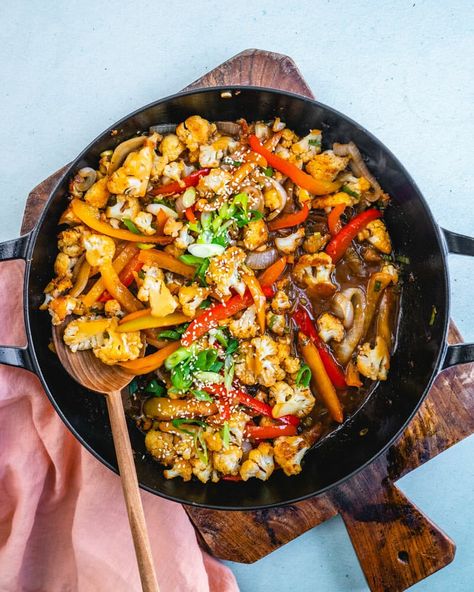 This easy cauliflower stir fry is an ideal healthy and easy dinner idea! It's full of nutrients and covered in a punchy sauce. #caulifower #stirfry #cauliflowerstirfry #easydinner #healthydinner #plantbaseddinner Non Dairy Dinner, Mexican Sweet Potatoes, Vegan Taco Salad, Cauliflower Stir Fry, A Couple Cooks, Dairy Free Recipes Dinner, Tofu Curry, Dairy Free Dinner, Easy Cauliflower