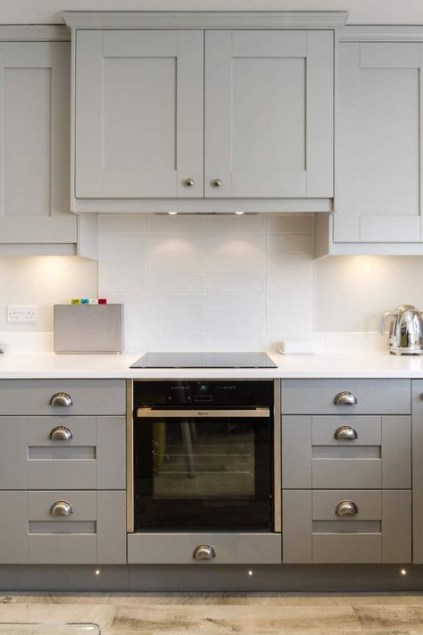 Simple idea for above range hood. I am leaning towards the entire kitchen being pale grey and having white work tops. Kitchen Range Hood Cabinet, Flat Range Hood Ideas, Shaker Kitchen Splashback Ideas, Cabinets Above Range, Kitchen Hood With Cabinets Above, Flat Range Hood, Concealed Hood Kitchen, Cabinet Above Range Hood, Pale Grey Shaker Kitchen