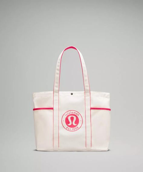 Daily Multi-Pocket Canvas Tote Bag 20L *Logo | lululemon SG Lululemon Bag, Lululemon Bags, Picnic Essentials, Pink Lululemon, Canvas Tote Bag, Small Items, Easy Access, Canvas Tote, A Book