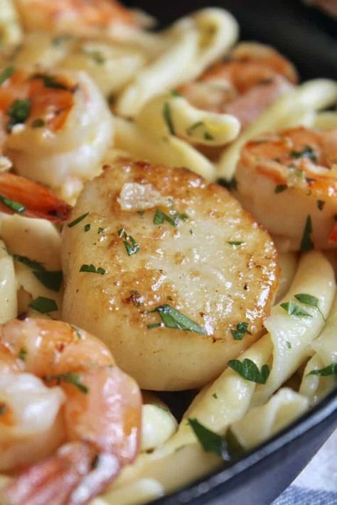 Seafood pasta with shrimp and scallops and lots of garlic is seriously one of the fastest and most delicious meals you can make using pasta! Seafood Tortellini Recipes, Swedish Semla, Scallops Pasta, Scallop Recipes Pasta, Shrimp And Scallop Recipes, Cream Buns, Seafood Pasta Dishes, Mixed Seafood, Scallop Pasta