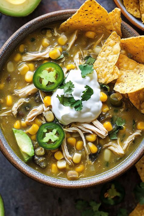 Green Chicken Chili combines tender chicken, green chilies, and a medley of spices to create a rich, zesty one-pot wonder. Easy Chicken Chili Verde, 505 Green Chili Recipes Crock Pot, Healthy Green Chicken Chili, Green Chilli Soup Recipes, Chili Verde Chicken Soup, Chicken Green Chilli Soup, Green Chili Chicken Tortilla Soup, Green Chicken Chili Recipes, Chicken Green Chili Recipes