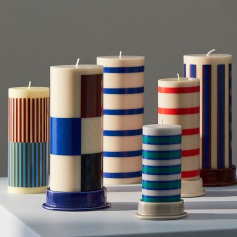 Crafted in earthenware with a semi-transparent glaze, the Column Candleholder by HAY is a low tubular design with a tempting colour palette. Designed to be used with HAY Column Candles, the minimalistic candleholder features a circular base that balances the design and catches any dripping wax. Available in different widths and colours, the candleholders can be used individually or grouped together in contrasting designs. 2026 Wedding, Colourful Candles, Flat Inspiration, Photography Set Up, Striped Candles, Cylinder Candles, Pinterest Room, Kids Room Lighting, Hay Design