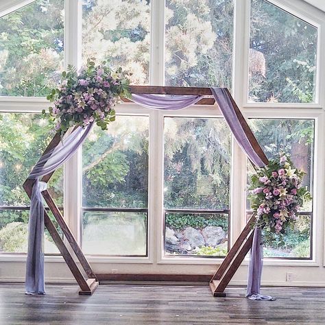 Centerpiece With Lavender, Lavender Alter Arrangements, Lavender And White Themed Wedding, Purple Floral Arch Wedding, Lavender Arbor Wedding Arches, Lavender Wedding Theme Flowers, Lavender Ceremony Decor, Lavender Wedding Arch Ideas, White And Lavender Wedding Decorations