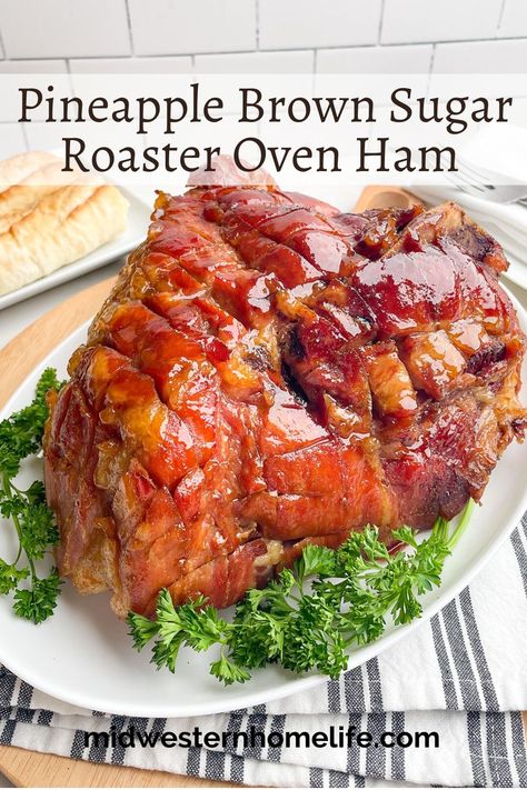 Ham in a Roaster Oven is juicy and succulent with a sweet and savory brown sugar pineapple glaze -- and frees up oven space during holidays and special occasions. Easter Ham In Electric Roaster, Baking Ham In Electric Roaster, Brown Sugar Pineapple Ham Oven, Roast Ham Oven, Oven Baked Ham With Pineapple, How To Cook A Whole Ham In The Oven, How To Bake A Bone In Ham In The Oven, Roasting Ham Oven, Ham In A Cooking Bag