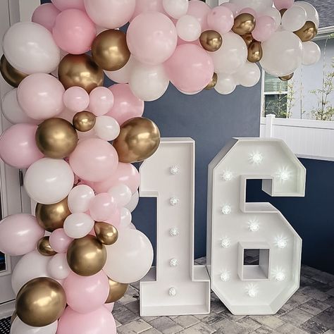 Ready to take your party to the next level? Look no further than Ellie's Party Supply 🎉🎈 DIY pink and gold balloon decorations! These beauties are super easy to assemble and make for the perfect photo backdrop. 📸 Your 16th birthday party will be unforgettable with this stunning decor. 💖 Don't forget to tag us in your pics so we can see how amazing your party turned out! #ElliesPartySupply #PartyDecorationIdeas #DIYPartyDecor #Sweet16 #PinkAndGoldTheme #PhotoBackdrop #PartyInspo #BalloonArch... White Pink And Gold Birthday Decorations, Pink And Gold Bday Party Ideas, Sweet 16 Photo Backdrop Ideas, Pink And Gold Sweet 16 Decorations, Birthday Balloon Backdrop Ideas, Pink 13th Birthday Party Ideas, Sweet 16 Backdrop Ideas, Sweet 16 Photo Backdrop, Pink 16th Birthday Party