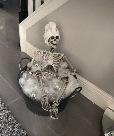 Ghost And Skeleton Decor, Skeleton Living Room Decor, Outdoor Apartment Halloween Decor, Skeleton Cauldron Bath, Med Spa Halloween Decor, Skeleton In Tub With Bubbles, Skeleton Bubble Bath Diy, Skeleton Taking A Bath, Skeleton Bubble Bath