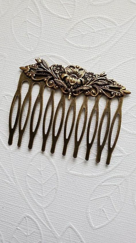 Floral Bouquet Haircomb This Beautiful Rose Floral Bouquet Haircomb is bronze and is captivating and Beautiful. This comb can be used for special occasions like weddings, or for everyday occasion.  ☻Link to More Hair Accessories: https://www.etsy.com/shop/FashionCrashJewelry?ref=profile_header&search_query=hair+accessories ☻Link to The ENTIRE SHOP: https://www.etsy.com/shop/FashionCrashJewelry?ref=shopsection_shophome_leftnav&ga_search_query=crystal%2Bnecklace Our Motto ~ Happy Customers Are Awe Antique Hair Accessories, Vintage Hair Pin, Pretty Hair Clips, Hair Comb Aesthetic, Light Academia Accessories, 1900s Accessories, 1890s Accessories, Thrift Accessories, Vintage Jewelry Aesthetic