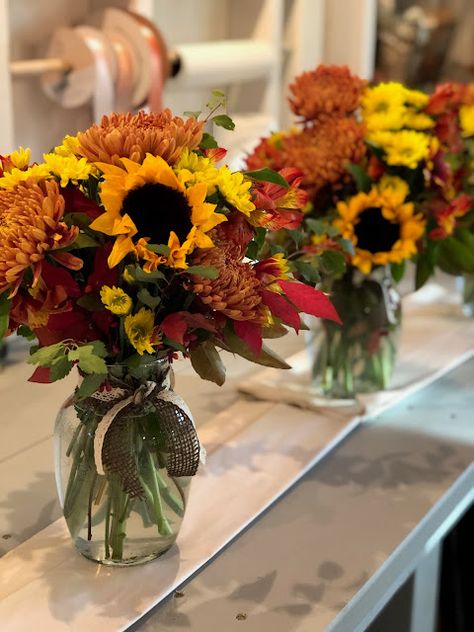 Sunflower Arrangements Fall, Fall Centerpiece With Sunflowers, Fall Flower Arrangements Mason Jars, Fall Vase Arrangements Floral, Yellow Fall Floral Arrangements, Sunflower And Mum Bouquet, Sunflower Fall Centerpieces, Fall Flower Arrangements With Sunflowers, Fall Flower Arrangements Sunflowers