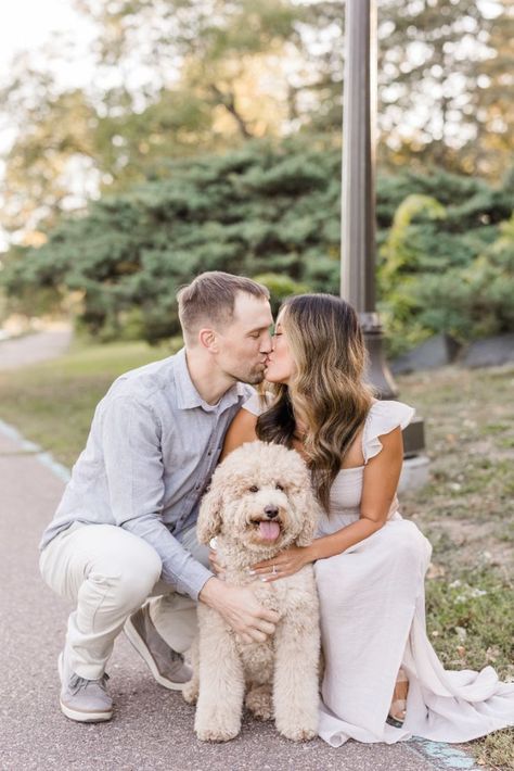 Engagement photos with dog in Saint Paul, Minnesota with goldendoodle Engagement Photo Dog, Engagement Photoshoot Ideas With Dogs, Engagement Photoshoot With Dog, Engagement Pictures With Dogs, Couple Photo With Dog, Engagement Pics With Dog, Engagement Photos Poses With Dog, Puppy Engagement Pictures, Engagement Photo Inspo With Dog