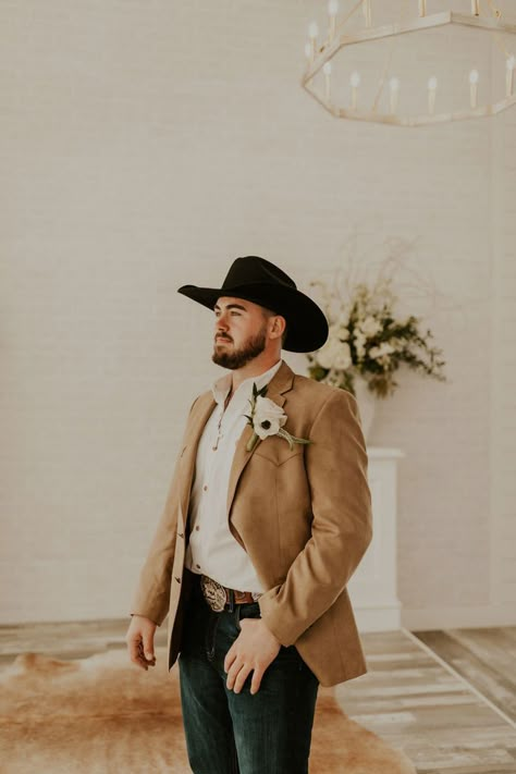 Luxury Elopement + Intimate Wedding Photographer based in Denver, Colorado. Indoor groom portraits, suede groom's coat, western groom style, groom style, luxury western wedding, luxury western groom, groom, groom posing Groom Cowboy Outfit, Western Groomsmen, Western Wedding Groom, Groom In Jeans, Western Wedding Theme, Always And Forever Wedding, Western Groom, Pink Orange Wedding, Cowboy Groom