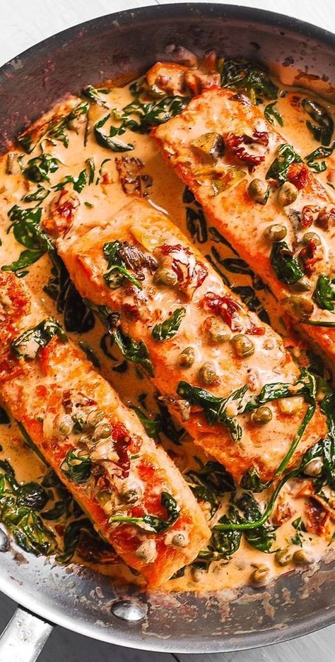 Tuscan Salmon with Sun-Dried Tomatoes, Spinach, Artichokes, Capers, Garlic Creamy Tuscan Salmon, Salmon With Cream Sauce, Salmon Recipe Pan, Tuscan Salmon, Sauce For Salmon, Pan Seared Salmon, Seared Salmon, Salmon Dishes, Fish Dinner