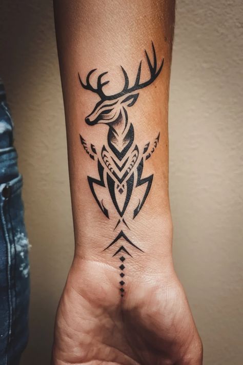 Forearm tattoo of a stylized geometric deer. Celtic Stag Tattoo Design, Small Tattoo Ideas For Men Unique, Hunting Tattoos For Women, Deer Horn Tattoo, Native Tattoos For Women, Tattoo Ideas Deer, Female Deer Tattoo, Deer Track Tattoo, Deer Tattoos For Women