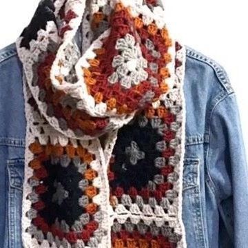 Şebnem Graham on Instagram: "Made with trendy, multicolor yarn, these crochet long scarves are sure to turn heads. Wrap yourself in style with this one-of-a-kind granny square scarf. Handmade with care, this crochet scarf is the perfect accessory for any outfit. The bold, multicolor yarn is trendy and eye-catching. With so many ways to style it, you’ll never get bored of this scarf. Any way you wear it, this one of a kind granny square long crochet scarf is sure to gather many compliments every time you wear it. . Avaliable on my Etsy shop 🛍 . Bilgi ve sipariş için DM lütfen . #happyday #crochetlove #fashion #handmade #giftforher #giftforhim #unique #christmas #atkı #hediye #trendingreels #bohofashion" Crochet Granny Square Scarf, Multicolor Yarn, Crochet Wraps, Granny Square Scarf, Textile Inspiration, Scarf Handmade, Crochet Clothing, Square Crochet, Long Scarf