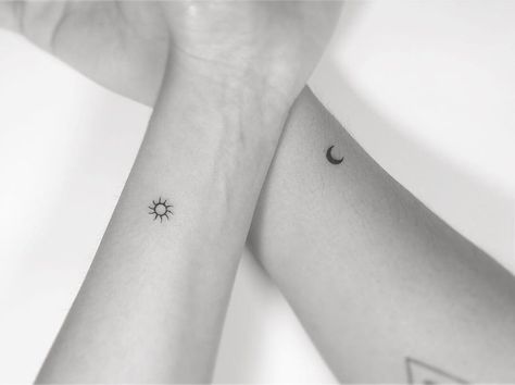 Black inked sun and moon couple tattoo Tattoo Sonne, Minimalist Tattoo Meaning, Typography Tattoo, Muster Tattoos, Small Girl Tattoos, Tattoos Geometric, Bff Tattoos, Lotus Tattoo, Subtle Tattoos