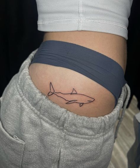 Shark Tattoo Hip, Shark Tattoo On Thigh, Tattoos For Women Stomach, Shark Tattoo Design Drawings, Simple Shark Tattoos For Women, Shark Rib Tattoo, Tattoo Ideas Shark, Shark Tattoos For Women, Fine Line Shark Tattoo