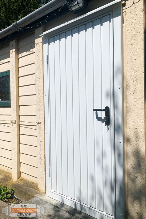 A recently installed pedestrian door, ideal as side doors to enter your garage on foot. This door in particular features a black lever handle and has been manufactured in the Carlton design. Pedestrian Garage Door, Garage Door Installation, Types Of Doors, Side Door, Garage, Garage Doors, Doors, Siding, Outdoor Decor