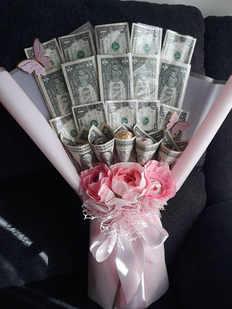 Money bouquet with crepe flowers. Each flower has chocolate! #beautiful #flowers #florist #moneybouquet #pink Pink Money Bouquet, Bouquet With Paper, Money Bouquets, Crepe Flowers, Money Bouquet, Paper Flowers, Bouquets, Florist, Beautiful Flowers