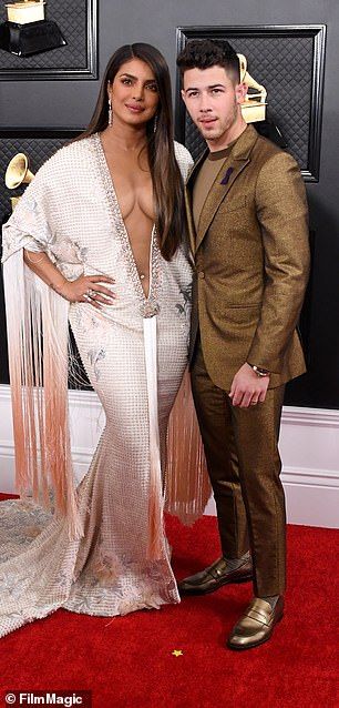 Priyanka took the plunge in white Scandalous Dresses, White Plunge Dress, Emily King, Danielle Jonas, Grammys 2020, Tanya Tucker, Plunge Dress, Sophie Turner, Nick Jonas