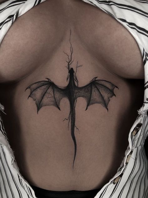 You know what's worse than having a messed up tattoo design on your skin forever? Getting called out about that epic fail online. Dragon On Stomach Tattoo, Dragon Tattoo On Chest Women, Tattoo Ideas Female Back Spine Dragon, Dragon Spinal Tattoo, Chest Tattoo Female Dragon, Dragon Lower Back Tattoo, Chest Tatoos Woman, Sternum Dragon Tattoo, Dragon Tattoo Sternum