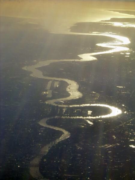 A view of the River Thames as it winds through London. You can see the loop of The Isle of Dogs and Canary Wharf, the Thames Barrier, then away towards the QEII bridge at Dartford where the river widens out and becomes the Thames Estuary. Thames Barrier, London Docklands, Isle Of Dogs, London Vintage, Lan Zhan, London Today, River Cruise, England And Scotland, London Town