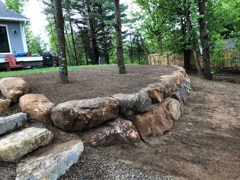 Boulder Retaining Wall Landscape, Rock Wall Retaining Walls, Natural Rock Retaining Wall Landscapes, Boulders Retaining Wall, Front Yard With Boulders, Rock Wall Garden Landscaping, Front Yard Landscaping Ideas Retaining Wall, Lake House Retaining Wall, Large Rock Retaining Wall Ideas