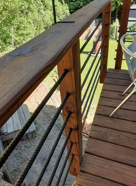 Another picture of the rebar deck rail Porch Railing Rebar, Railing With Rebar, Deck Rebar Railing, Rebar Porch Rails, Diy Rebar Deck Railing, Rebar Fencing Ideas, Wood And Rebar Railing, Log Cabin Cable Railing, Deck Railing Rebar