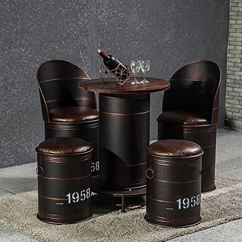 Oil Drum Chairs and Furniture Here is a bit of an oddity in furniture where chairs have been constructed from oil drums. This concept was created by S... Bar Banquette, Metal Barrel Furniture, Kursi Ban, Drum Chair, Nordic Restaurant, Garage Furniture, Welded Furniture, Barrel Table, Oil Barrel