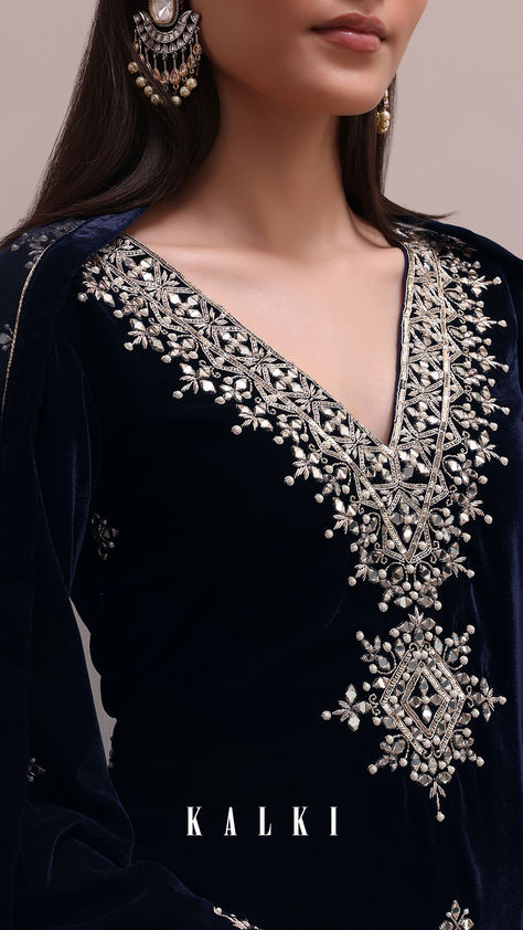 Enhance your wedding wear with our Blue Velvet Embroidered Dhoti Set. It features intricate mirror work, sequins, and cut dana detailing on a luxurious velvet fabric. The flared sleeves kurta is paired with a dhoti and an embroidered net dupatta. Package includes one kurta, dhoti, and dupatta. Intricate Mirror, Mirror Work Embroidery, Velvet Suit Design, Diwali Wallpaper, Mirror Embroidery, Kaftan Designs, Velvet Dress Designs, Draping Fashion, Navy Blue Velvet