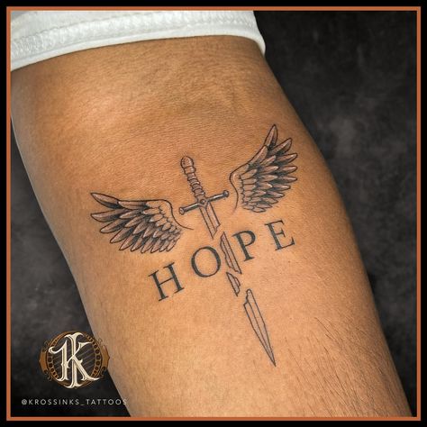 This tattoo design would carry deep meaning, with the broken sword showing past struggles, the wings indicating rising above, and hope as the unbreakable force tying it all together. . . Artist @kewal_patil92 Tattoo done at @krossinks_tattoos . . #krossinks_tattoos #tattooart #hope Hope Tattoo Designs, King Of Kings Tattoo, In God We Trust Tattoo, Deep Meaning Tattoos, Unbreakable Tattoo, Hope Tattoo, Rising Above, Deep Meaning, The Wings