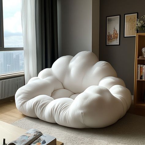 The Cloud Bean Bag is a plush, cloud-shaped seat that brings ultimate comfort and relaxation to any space. Designed to resemble a soft, fluffy cloud, its rounded, gentle contours and cushioned form cradle your body, offering a cozy place to lounge. Made from premium, breathable fabric and filled with high-density foam, this bean bag molds to your shape, providing ergonomic support. Perfect for reading, napping, or simply unwinding, the Cloud Bean Bag adds a whimsical, nature-inspired touch to... Cloud Home Decor, Room Seating Ideas Bedrooms, Cloud Furniture, Cloud Chair, Cloud Room, Magnolia Room, Wide Chair, Cloud Bed, Cloud Decor