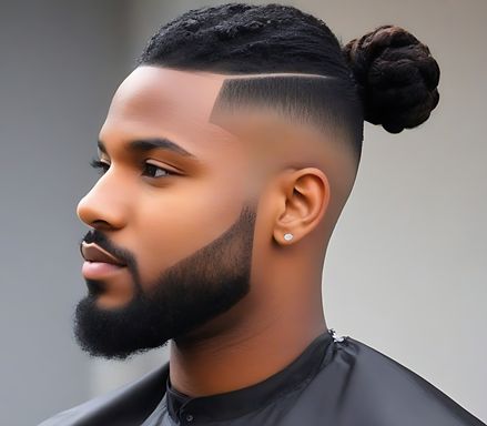 Embrace the trend of a man bun while keeping the sides clean with a mid taper fade for a balanced and stylish appearance. Man Bun Black, Black Male Haircuts, Taper Fade Black, Mid Taper Fade, High Top Dreads, Mid Taper, Man Bun Beard, Male Haircuts, Colored Dreads