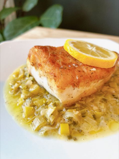 One of the tastiest and most prized catches of the sea, snook, is seasoned, pan-fried and paired with a buttery leeks sauce and fresh lemon Snook Fish Recipes, Snook Recipes Fish, Snook Recipes, Leek Vegetable, Air Fryer Recipes Pork, Recipes Pork, Recipes Seafood, Lemon Slices, Fish Tacos