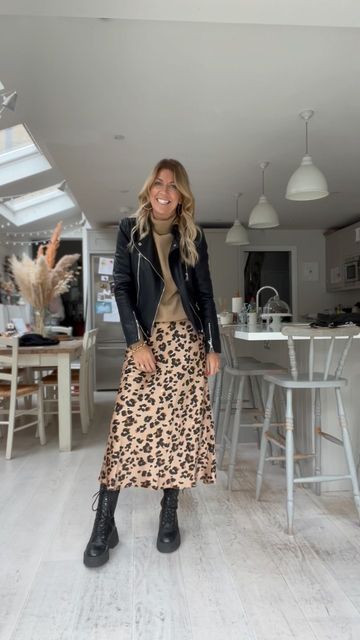 Animal Print Boots Outfit Winter, Satin Midi Skirt With Boots, Leopard Print Silk Skirt Outfit, Tiger Skirt Outfit Hijab, Leopard Print Skirts, Leopard Print Satin Skirt Outfit, Classy Boho Outfits, Animal Print Skirt Outfit Winter, Leopard Style Outfits