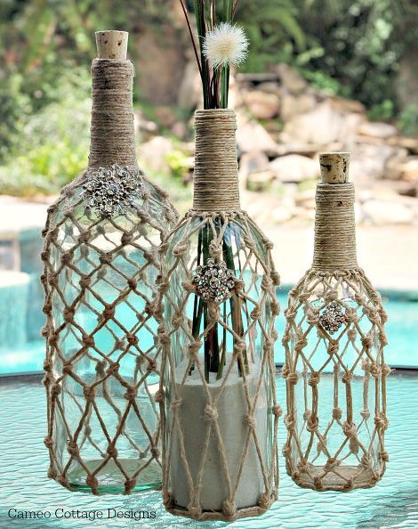 home decor wine bottle rope beachy ballard designs knockoff, crafts, repurposing upcycling Bottles With Flowers, Wine Bottle Project, Hantverk Diy, Wine Craft, Wine Bottle Art, Wine Bottle Diy Crafts, Wine Bottle Diy, Altered Bottles, בר מצווה