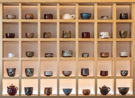 Living Water Tea House Japanese Tea Shop Interior, Tea House Design Interior, Japanese Shelf Design, Tea Shop Display, Japanese Tea House Design, Chinese Tea Room Interior, Tea Cafe Design, Tea Organization Ideas, Tea House Aesthetic